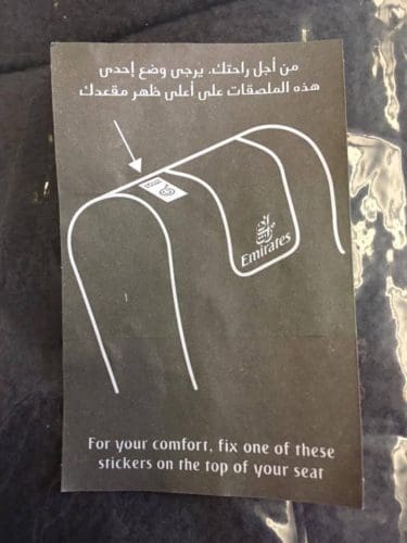 black seat sticker instructions on Emirates