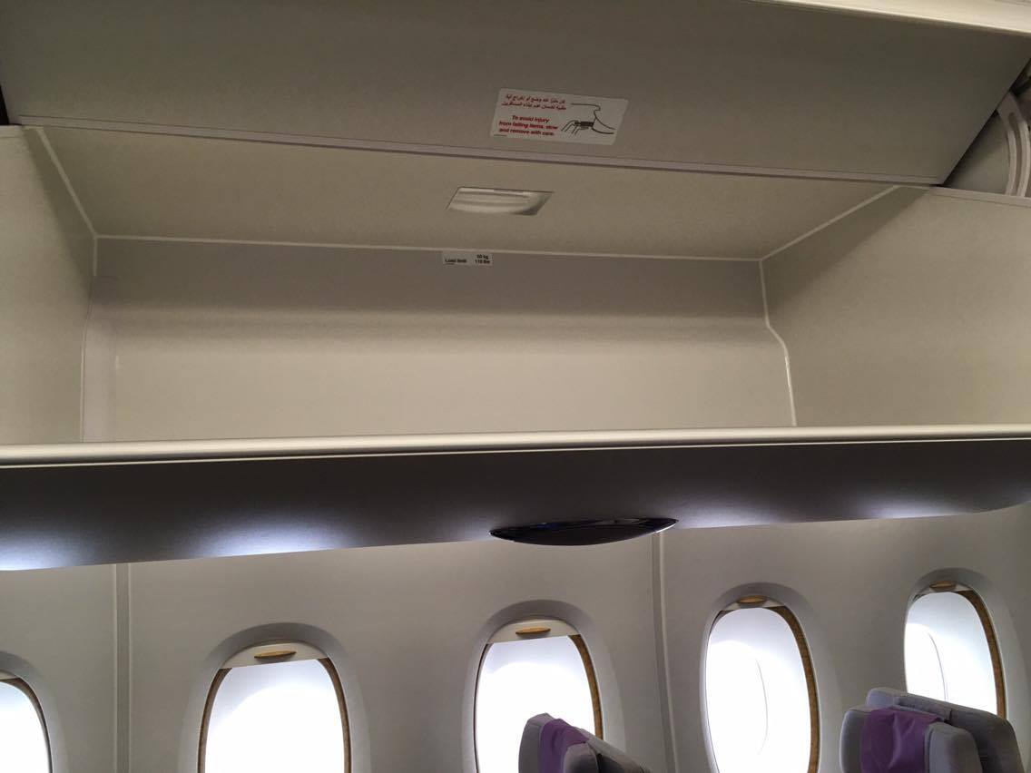 An empty overhead bin in economy on Emirates Airbus A380