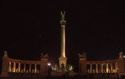 Millenáriumi Emlékmű Millennium Monument flanked either side by matching colonades at night in Hősök tere Heroes' Square, Budapest, Hungary