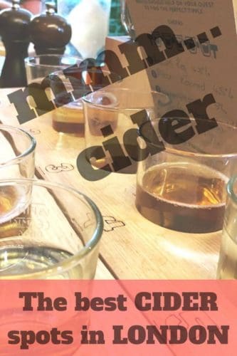 a flight of cider in a numbered wooden block. Written over it in black writing 'mmm...cider. The best CIDER spots in LONDON'