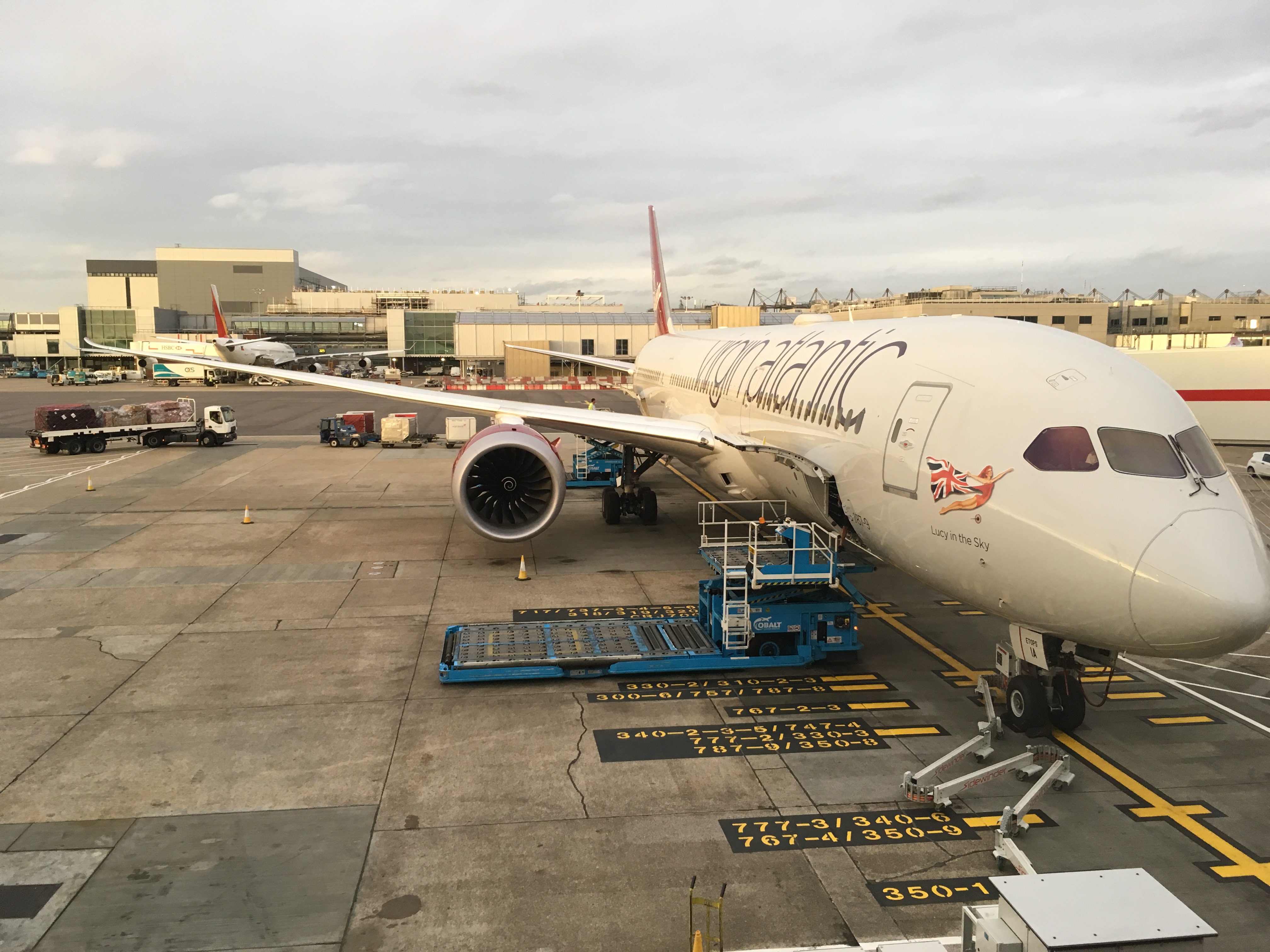 Virgin Atlantic Boeing 787-900 'Lucy in the Sky' plane on a stand at London Heathrow Airport