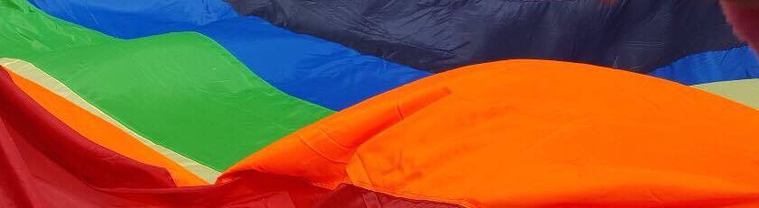 A close-up of a rainbow flag