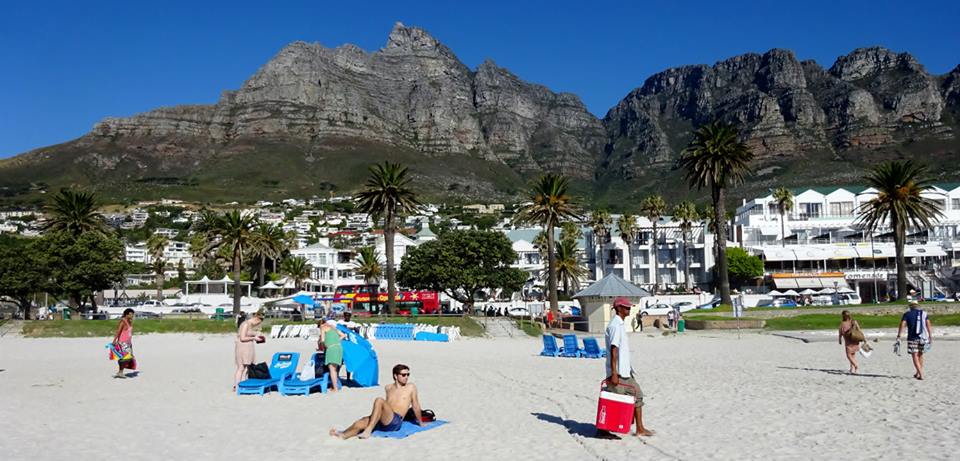 a beach with Table Mountain in the background, Cape Town, South Africa
