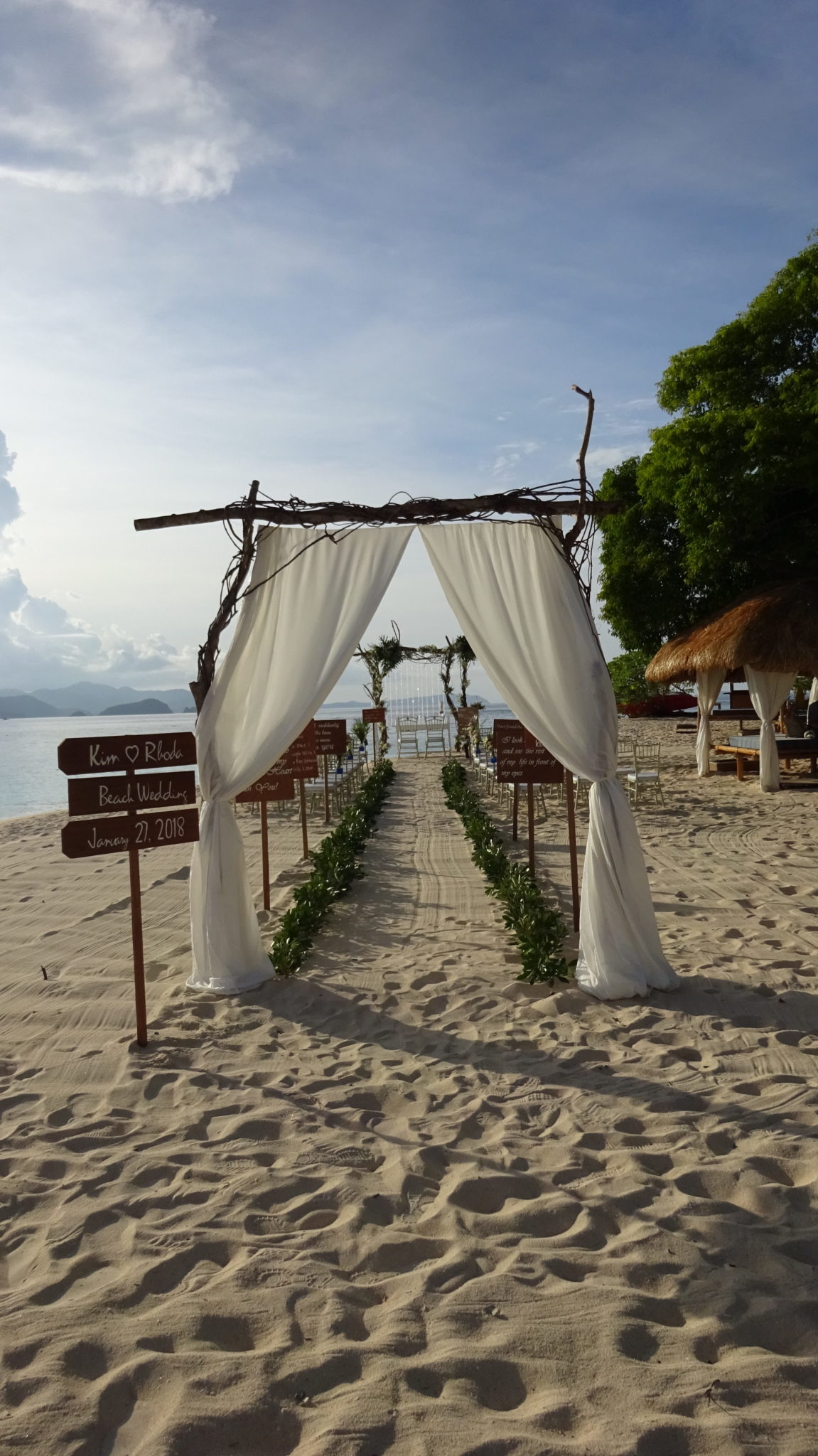 seats set for a wedding on the white sandy beach at Club Paradise Palawan