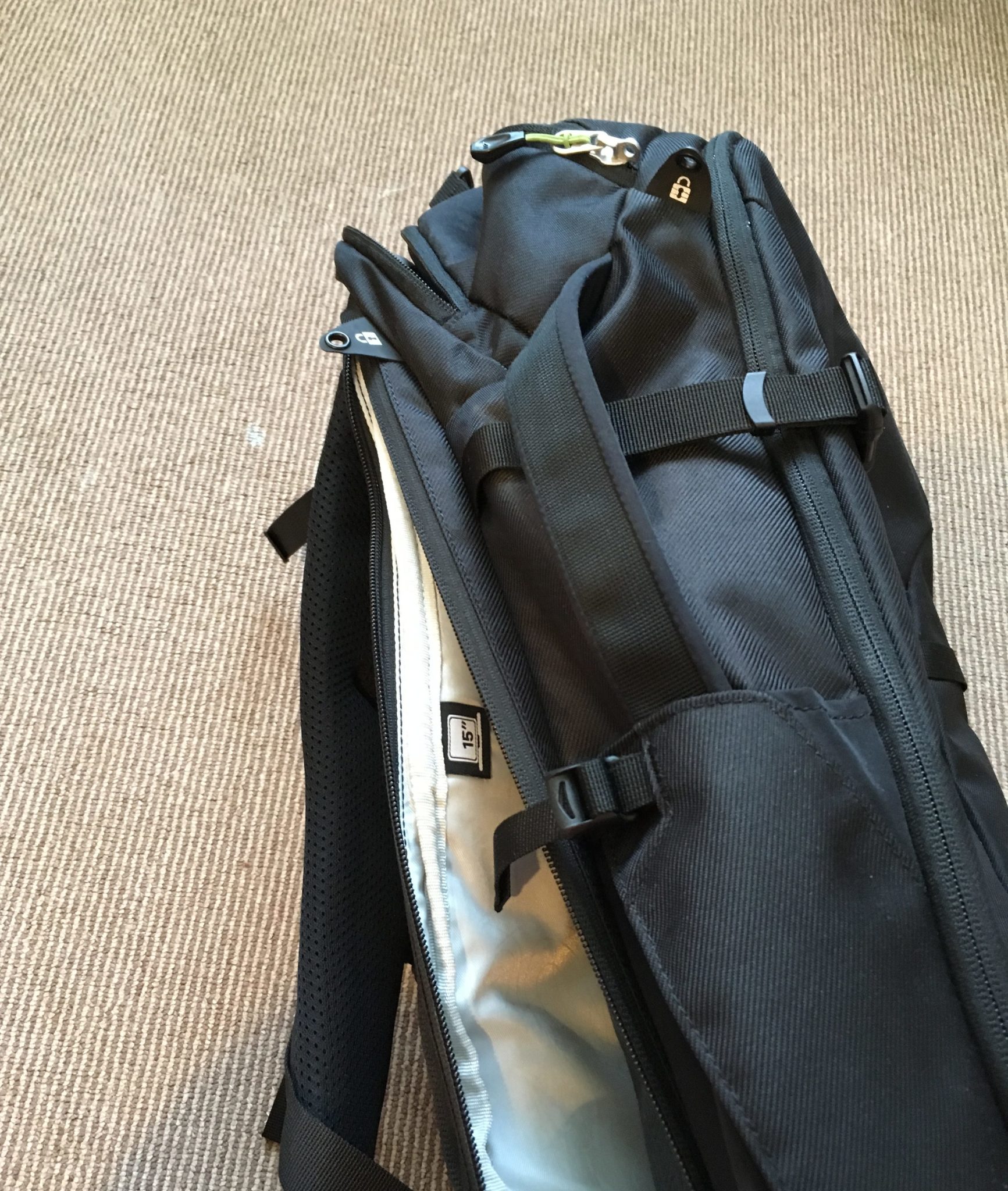 The back laptop pocket on a black Kathmandu Litehaul 38L Backpack