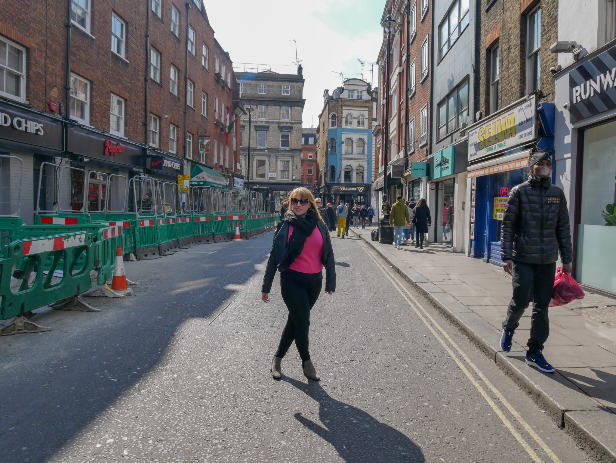 Rosie standing in Old Compton Street, Soho, London