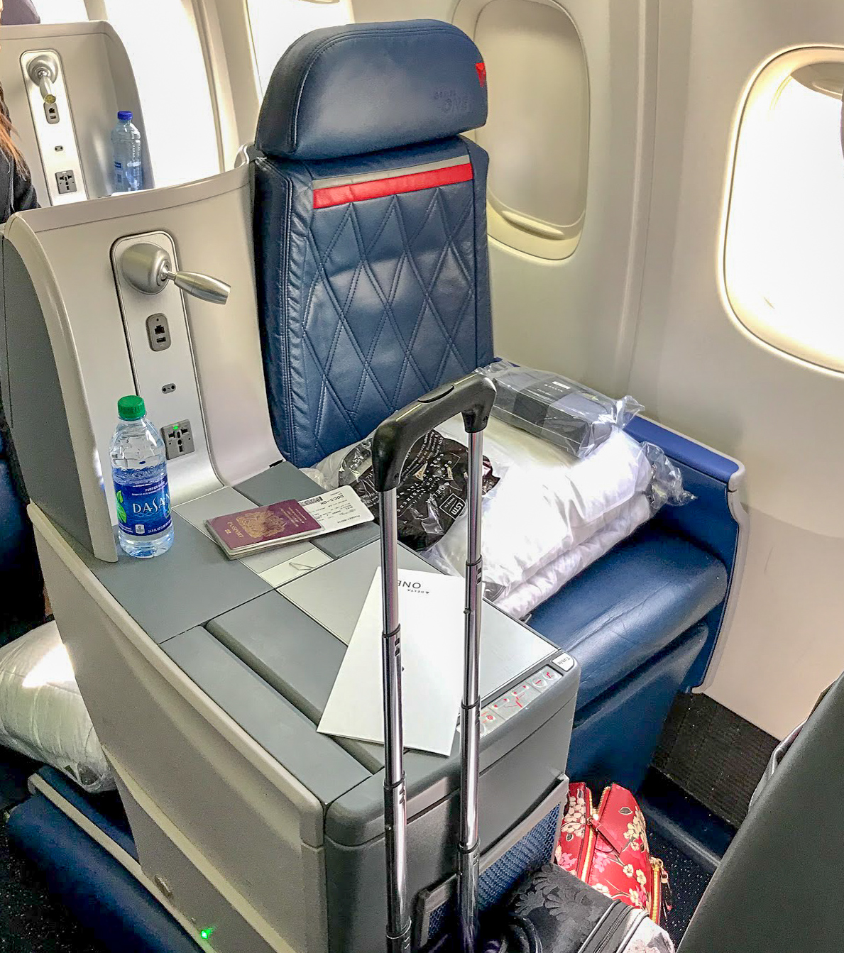 Delta One seat and side table on a Delta Air Lines Boeing 767