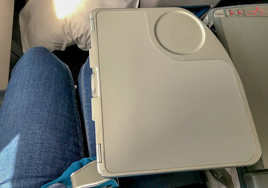 Tray table half open on Delta One Delta Air Lines Boeing 767