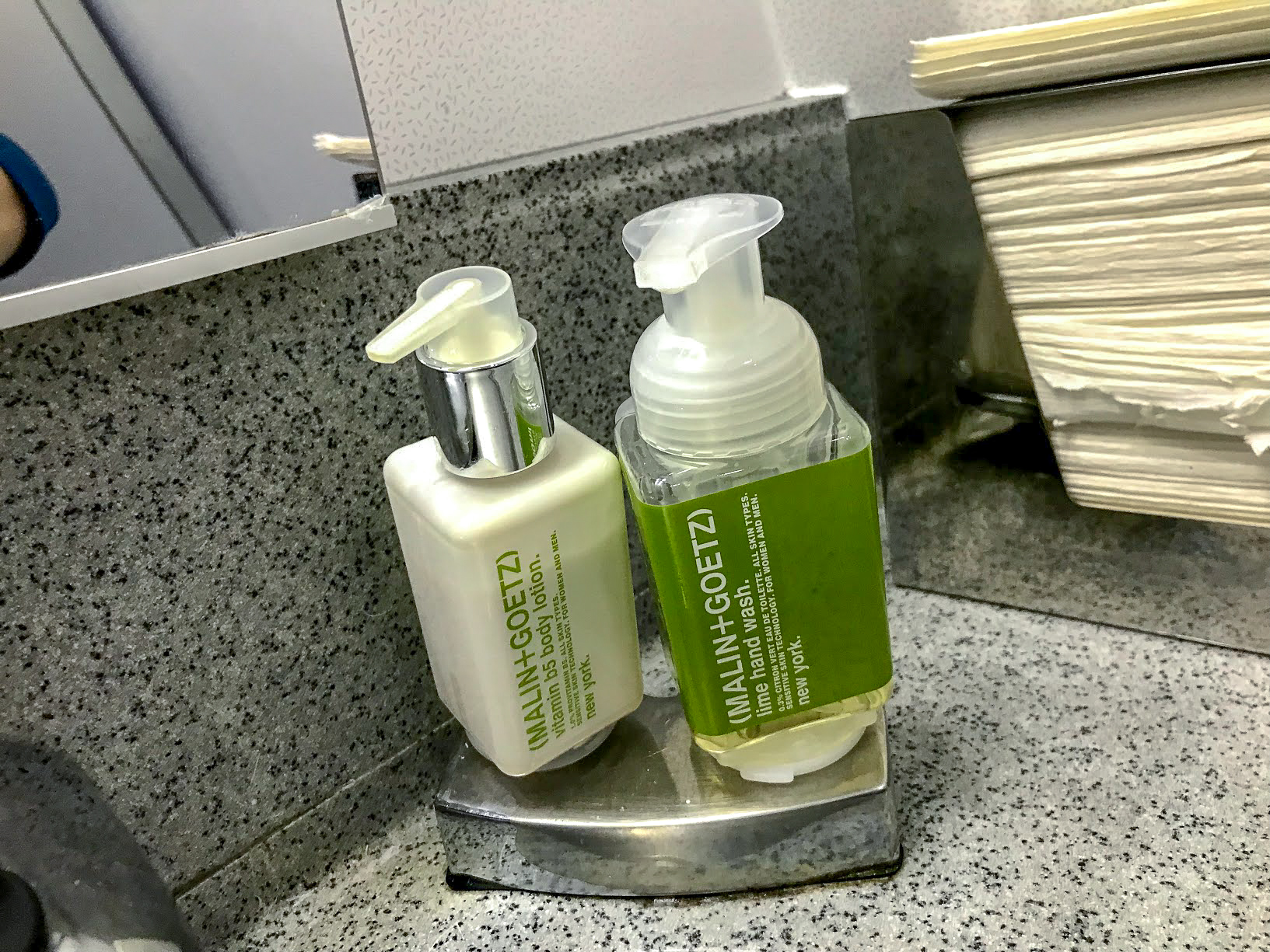 MALIN+GOETZ body lotion and hand wash in a Delta Air Lines Boeing 767 bathroom