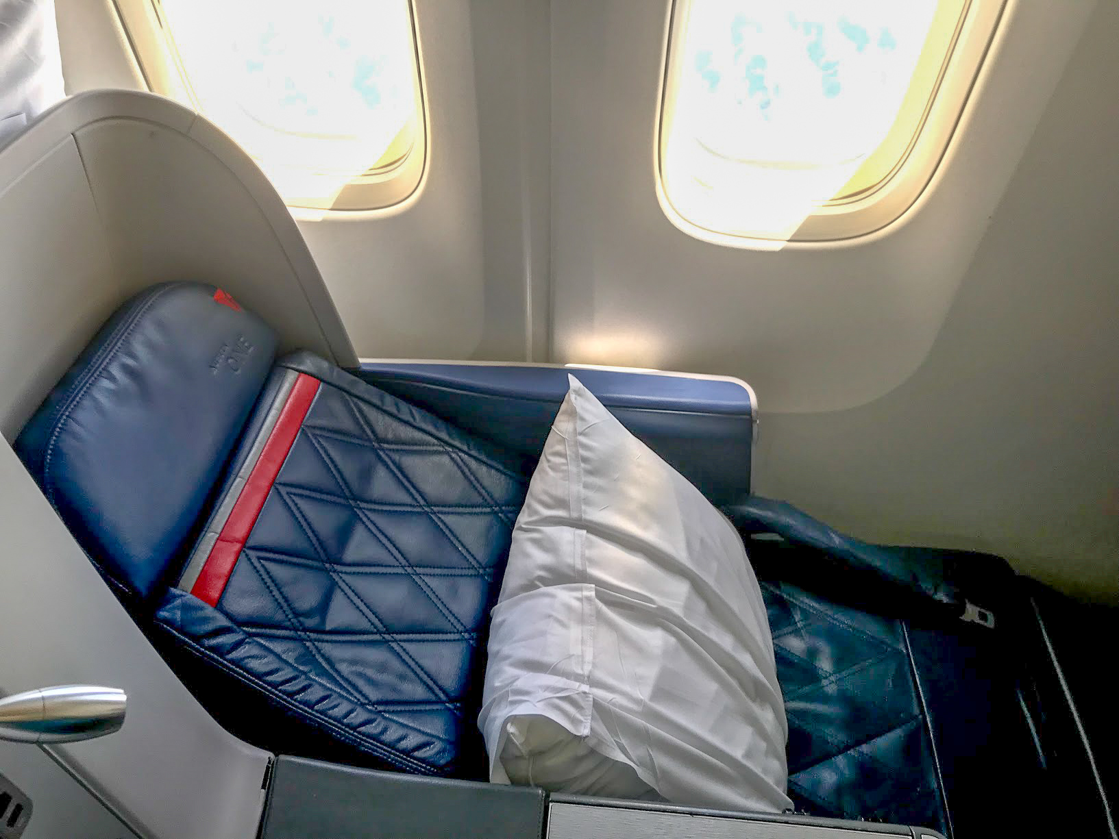 Delta One seat reclining on a Delta Air Lines Boeing 767