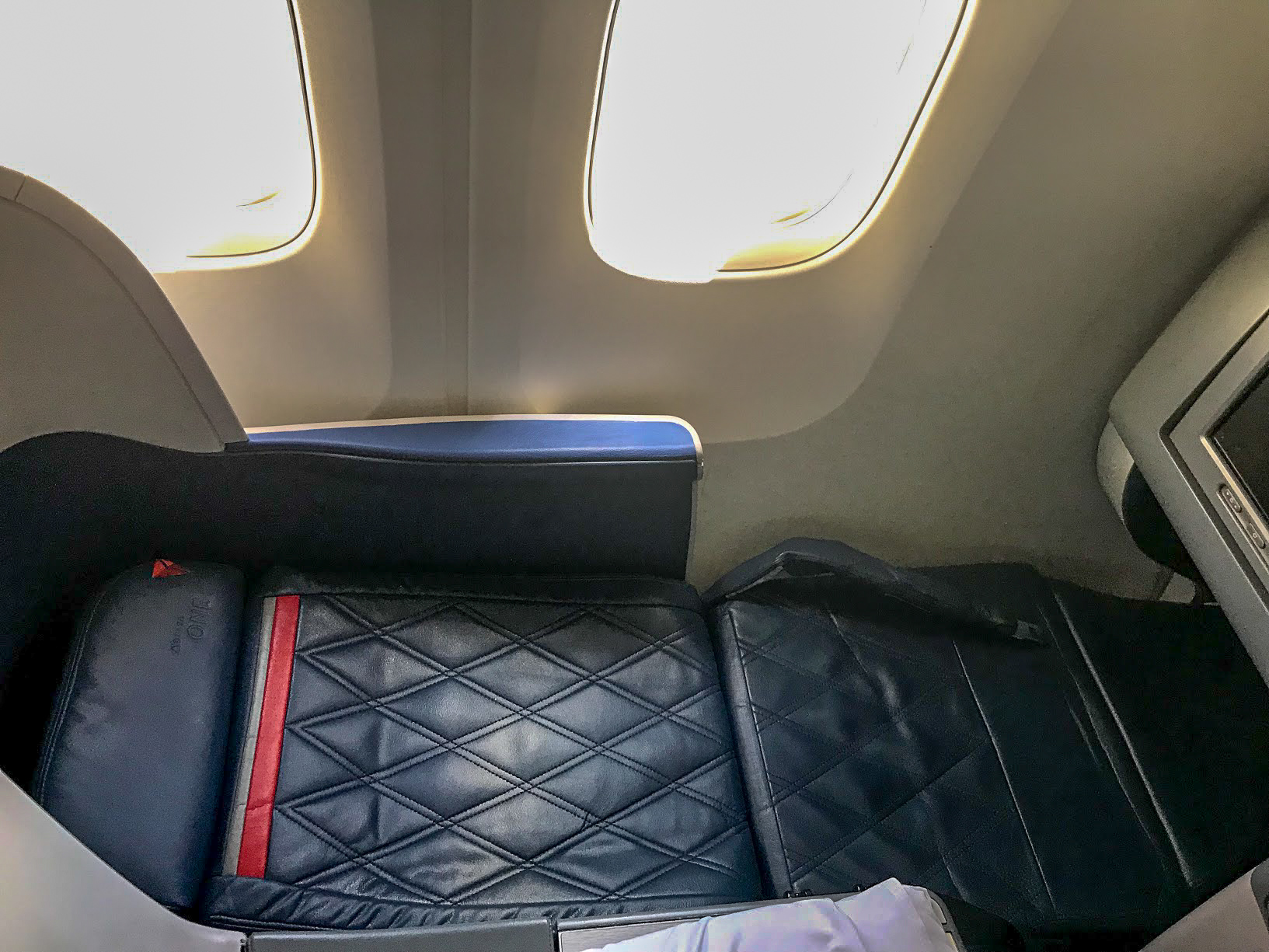 Delta One seat reclining on a Delta Air Lines Boeing 767