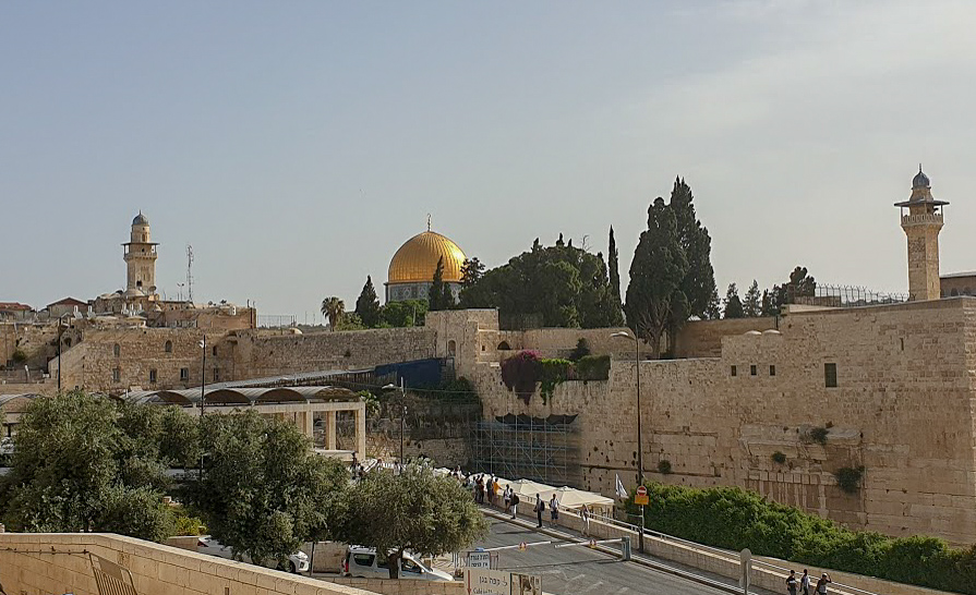 the walls of Jerusalem with the Dome of the Rock shrine in the background