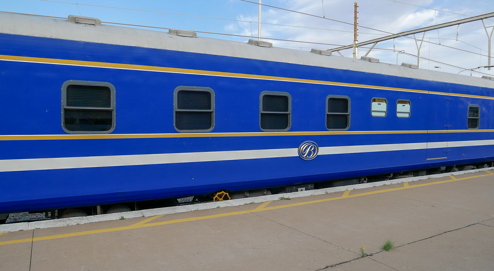 a Blue Train carriage at a station platform