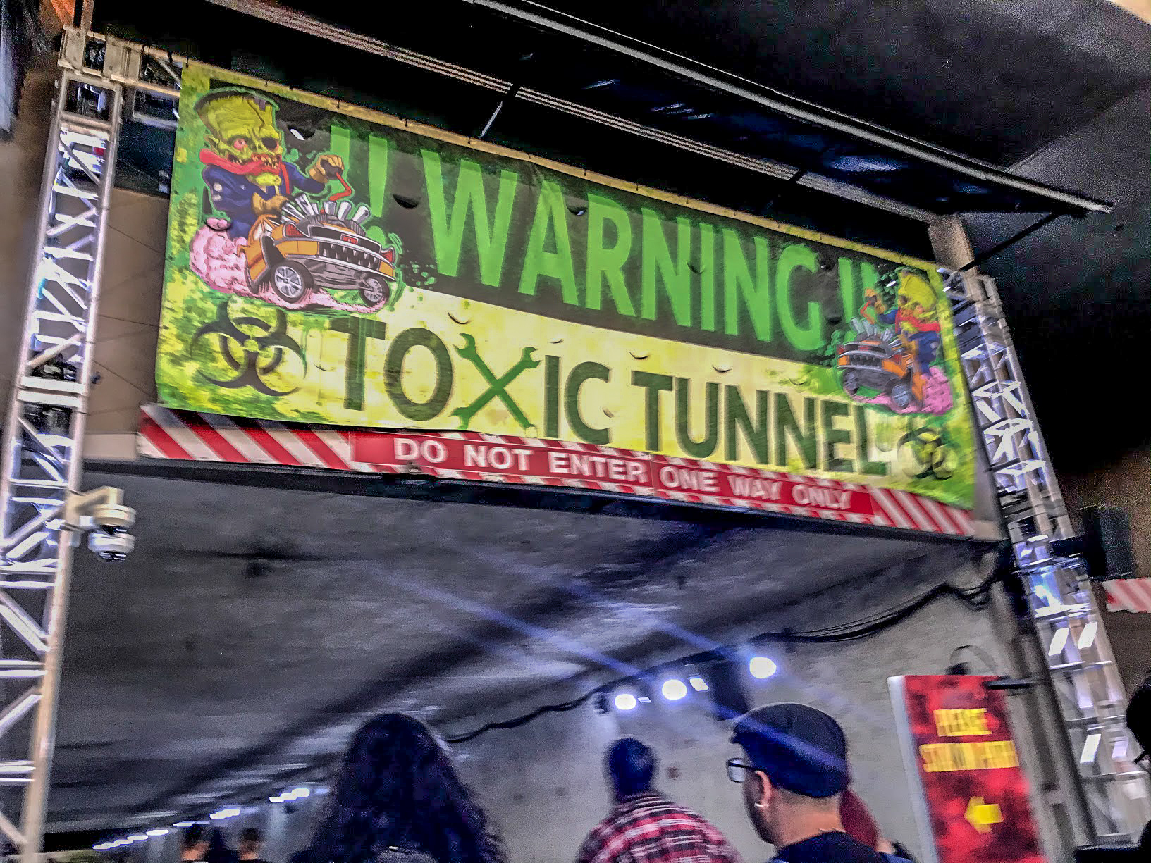 A blurry picture of the toxic tunnel sign