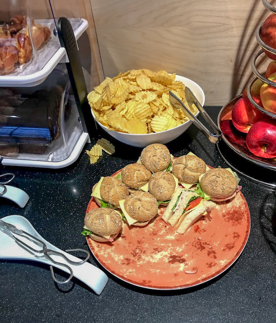 Sandwiches rolls and crisps in the Primeclass Business Lounge at Riga International Airport