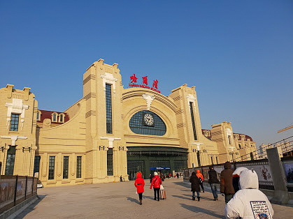The front of the station with two towers and a domed roof