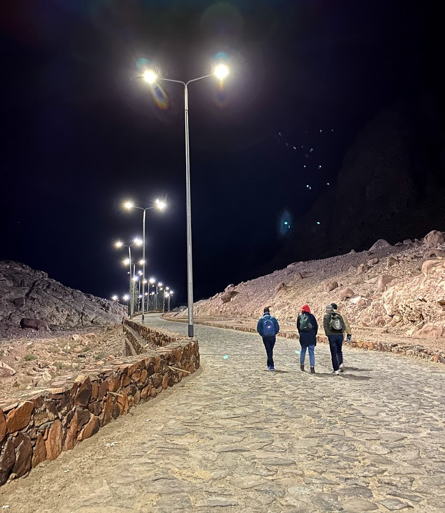 A wide paved path with streetlights up to Mount Sina, Egypt