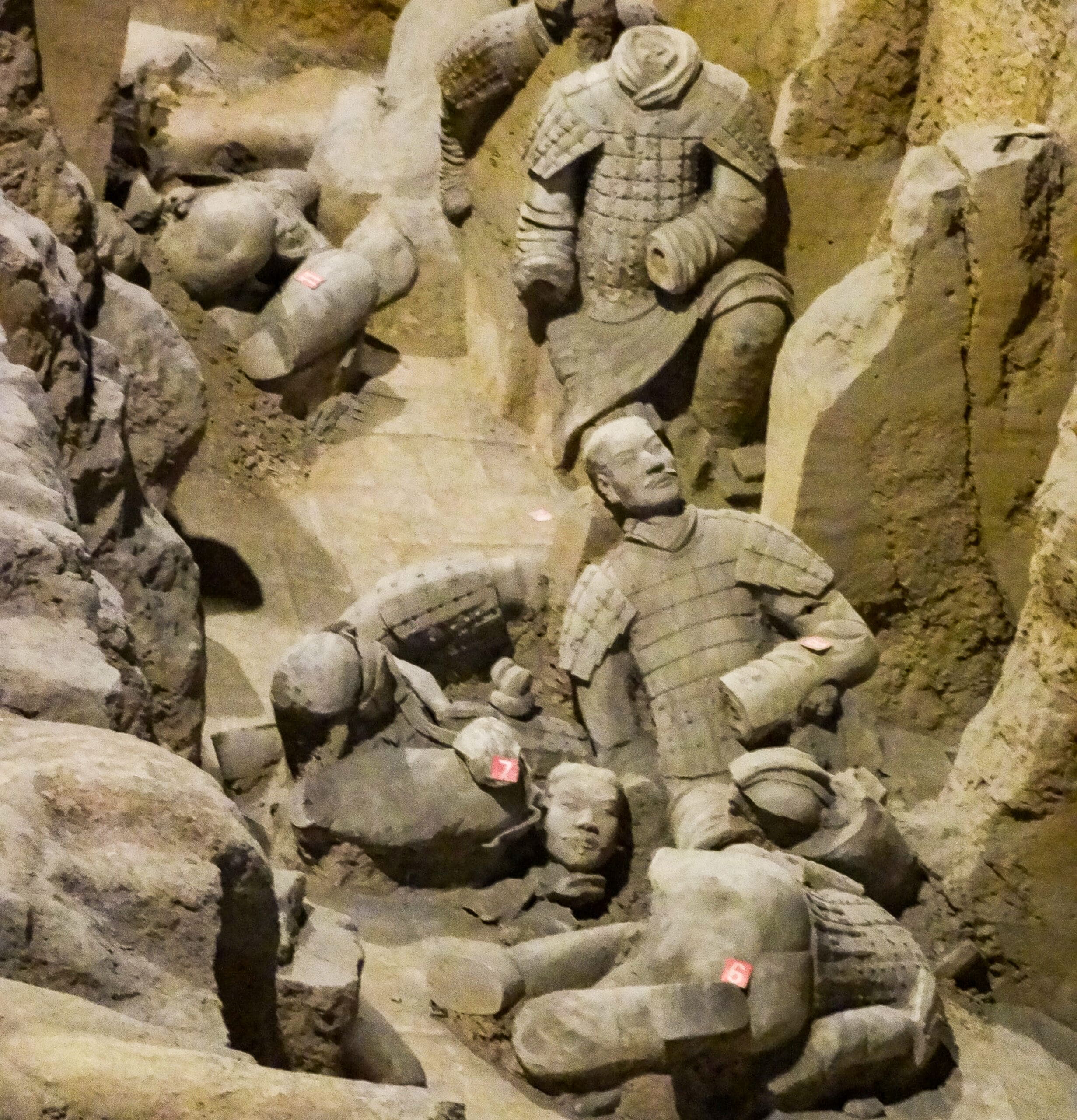 parts of the Terracotta Warriors of the Terracotta Army lie ruins in Pit 2 at Emperor Qinshihuang's Mausoleum, Xian, China