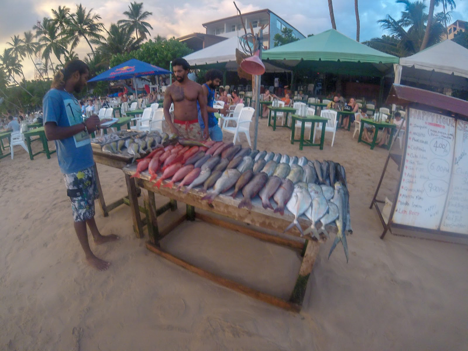 fish on display in front of a beach restaurant in Sri Lanka